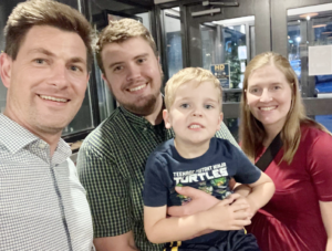 Vicar Aaron Carlson, Elijah and Clara, Holy Crosses' Past Vicar with Pastor John Rasmussen
